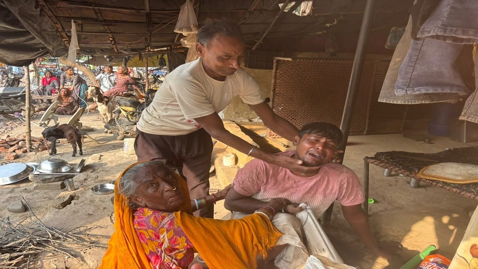A dumper truck loaded with Badarpur sand overturned onto a shanty crushing a boy named Manish to death his fam