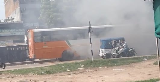 Kanpur Smoke billows from a state transport bus on the highway passengers safely evacuated amidst panic