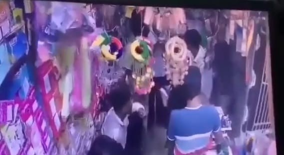 Orai Thugs run riot inside a general store they throttled the shopkeeper beat him with kicks and punches