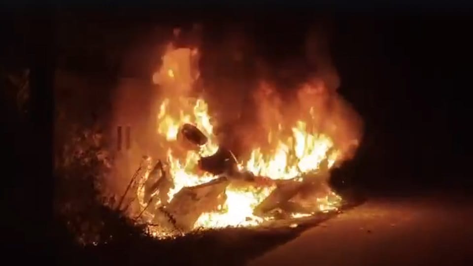 Car overturns after collision with a dumper and is completely gutted by fire in Ghaziaba