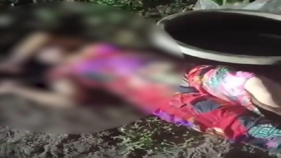 Faridabad Heavily intoxicated woman collapses on road crowd watches spectacle for an hour video goes viral