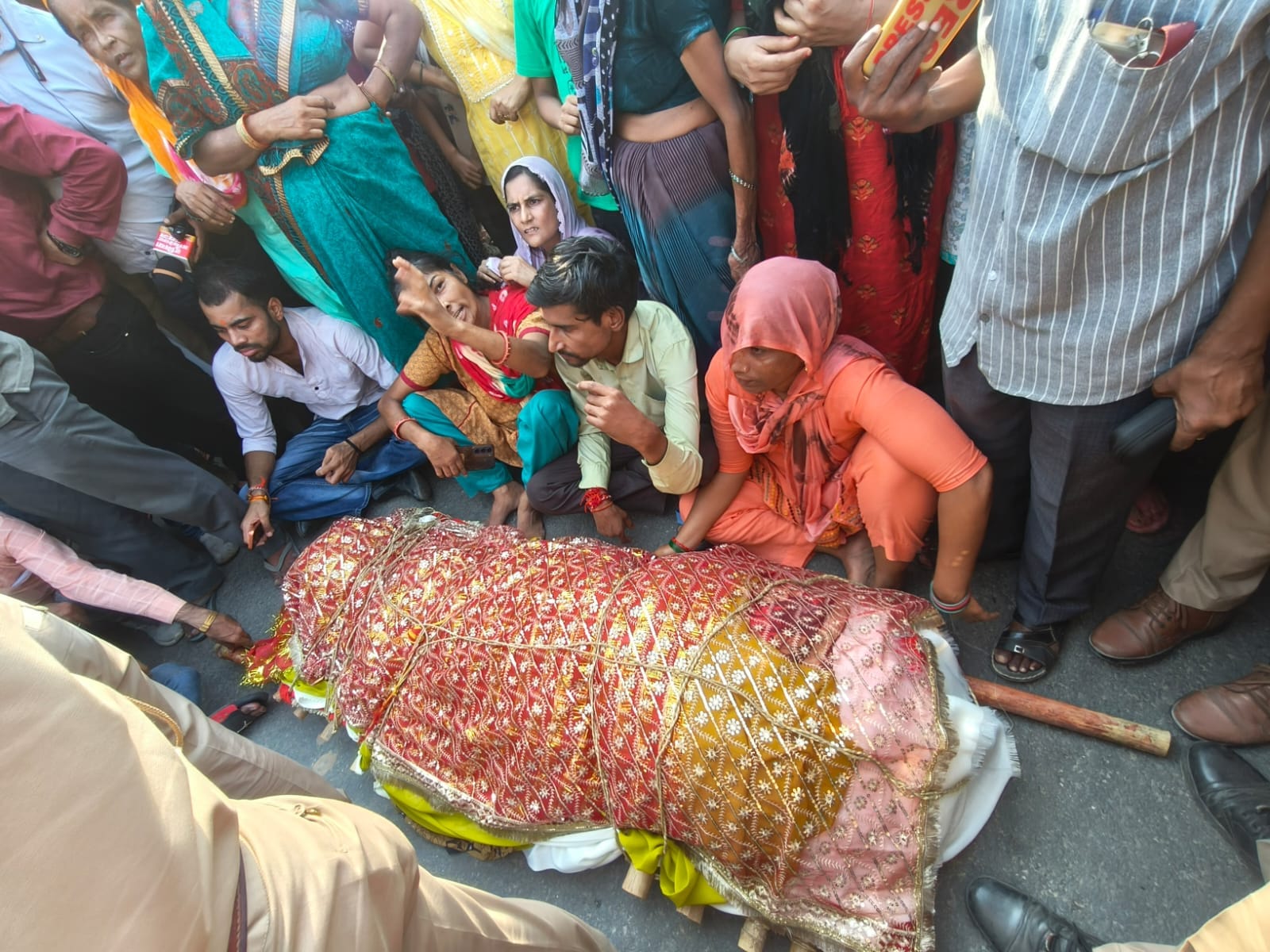 Woman dies after hit by pickup truck police register case against 50 unidentified persons