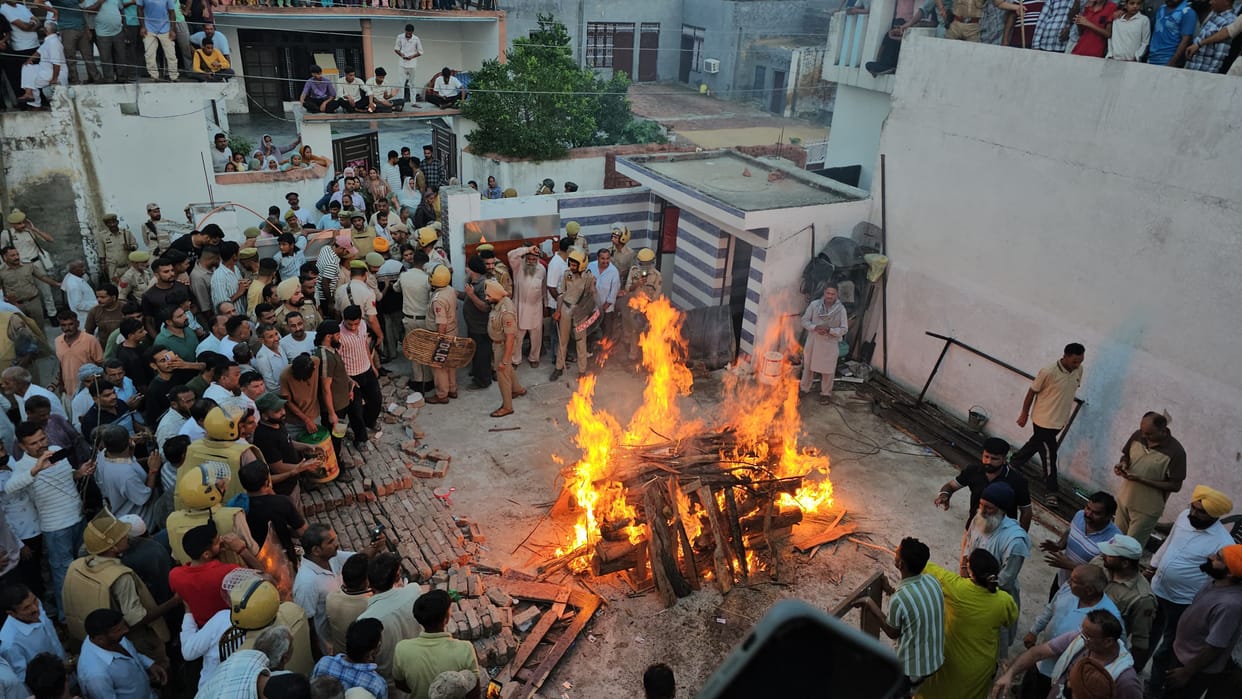 Uproar and tension over married woman's death; cremation held in the in-laws' courtyard.