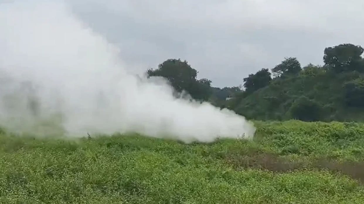 Smoke emerges from the ground in Ekra, Dhanbad; residents in a state of panic.