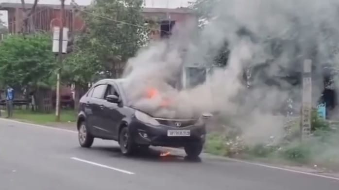 Kannauj Moving car turns into a fireball flames erupt after smoke rises from the bonnet four people saved