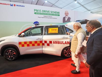 PM Modi overlooking Electric Ambulance