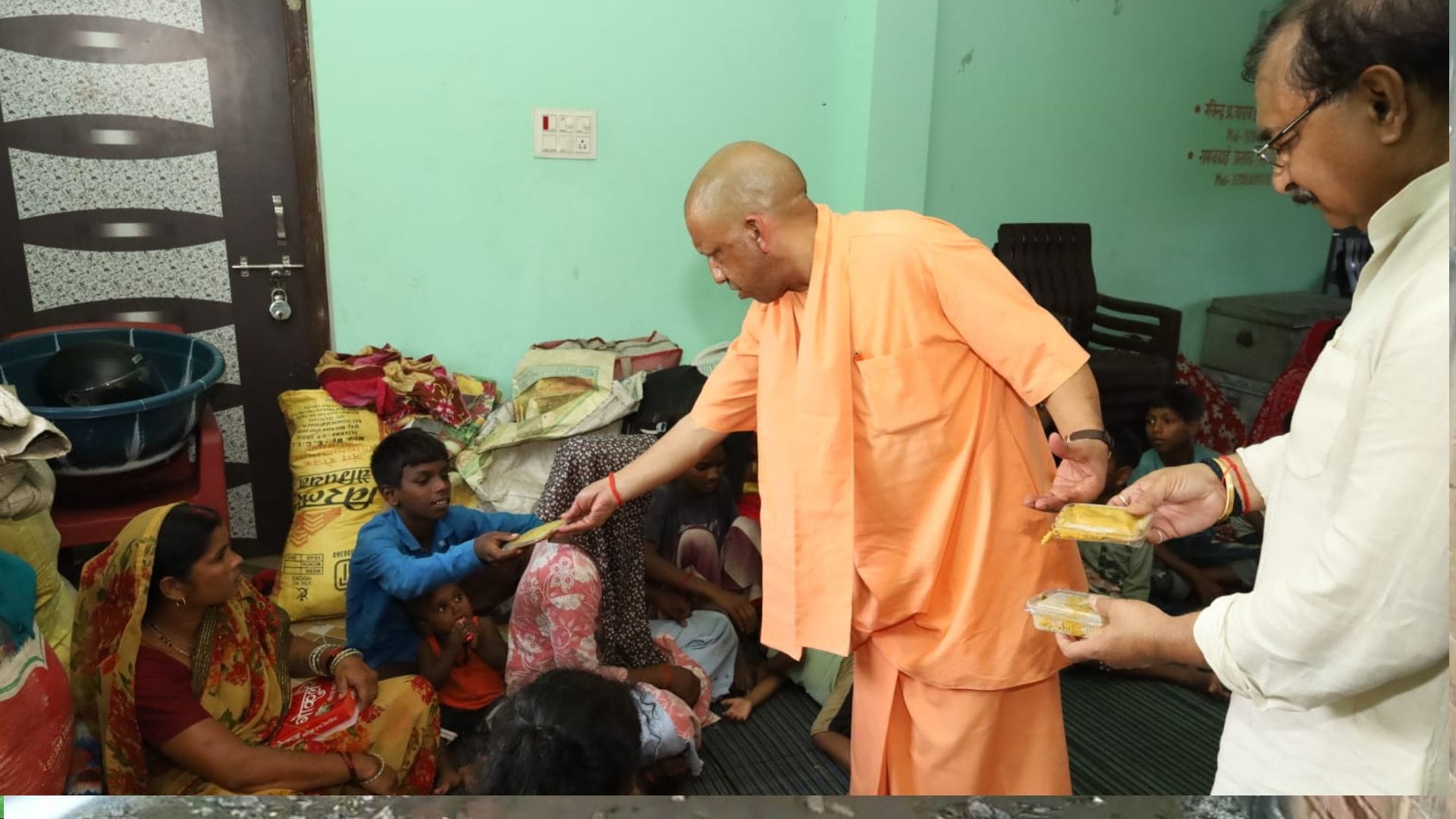 CM Yogi among flood victims in Kushinagar, 5,000 relief kits distributed.