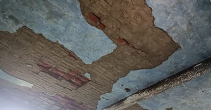 Kanpur Plaster falling from the ceiling and cracks in the walls classes being held in a dilapidated building