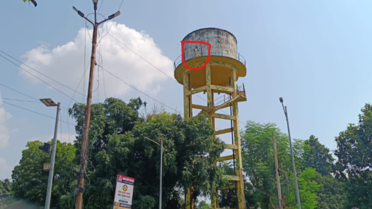 Prayagraj: Woman climbs water tank, threatens to jump to her death over SDM and Lekhpal.