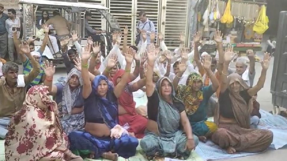 Family stages sit-in ashram after youth goes missing following initiation by Sant Premanand