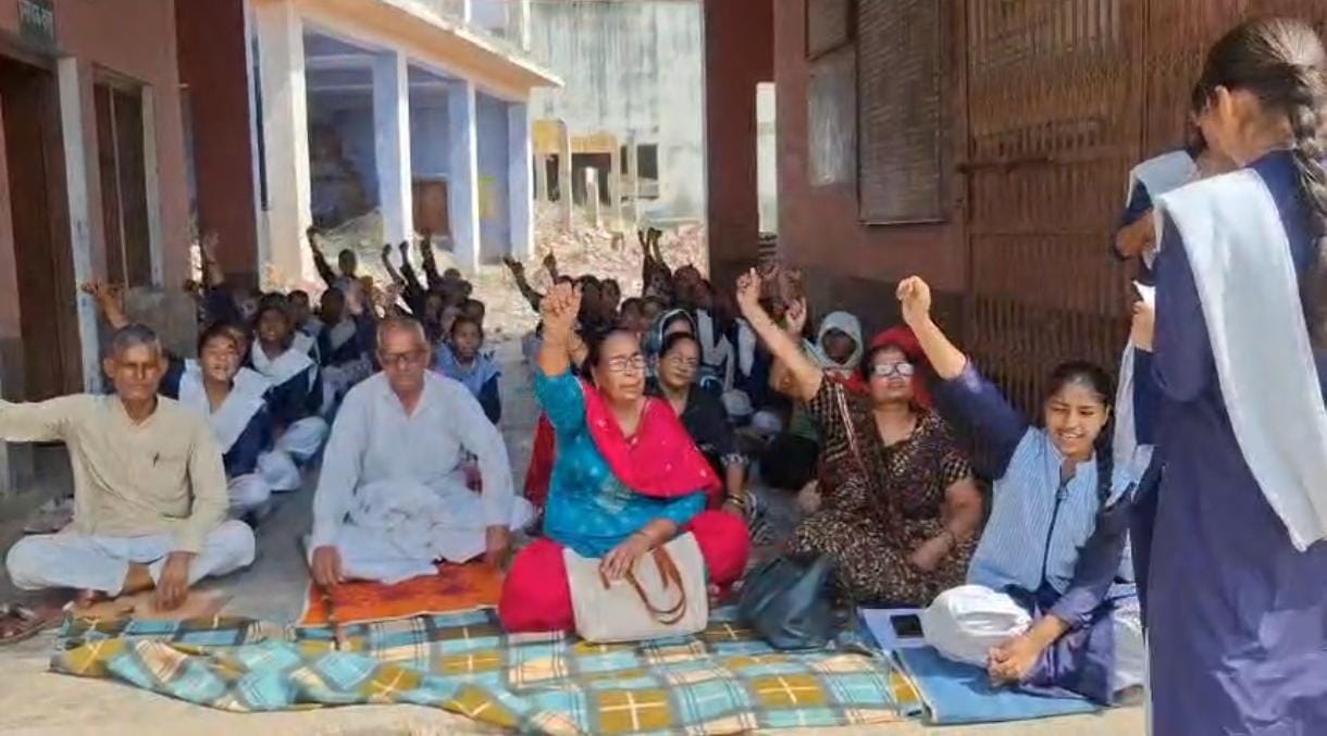 Students and teachers sat on strike to save the school, renovation work of Pura Mahadev temple is going on.