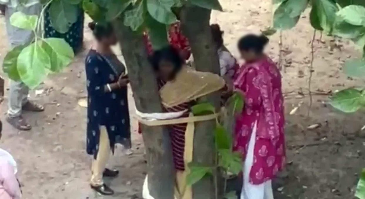 Video of woman being beaten after being tied to a tree goes viral; one woman arrested.