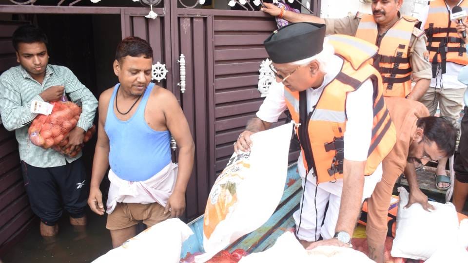 photos reveal terrifying scale of floods in Lucknow tears welled up in people eyes moment they received relief