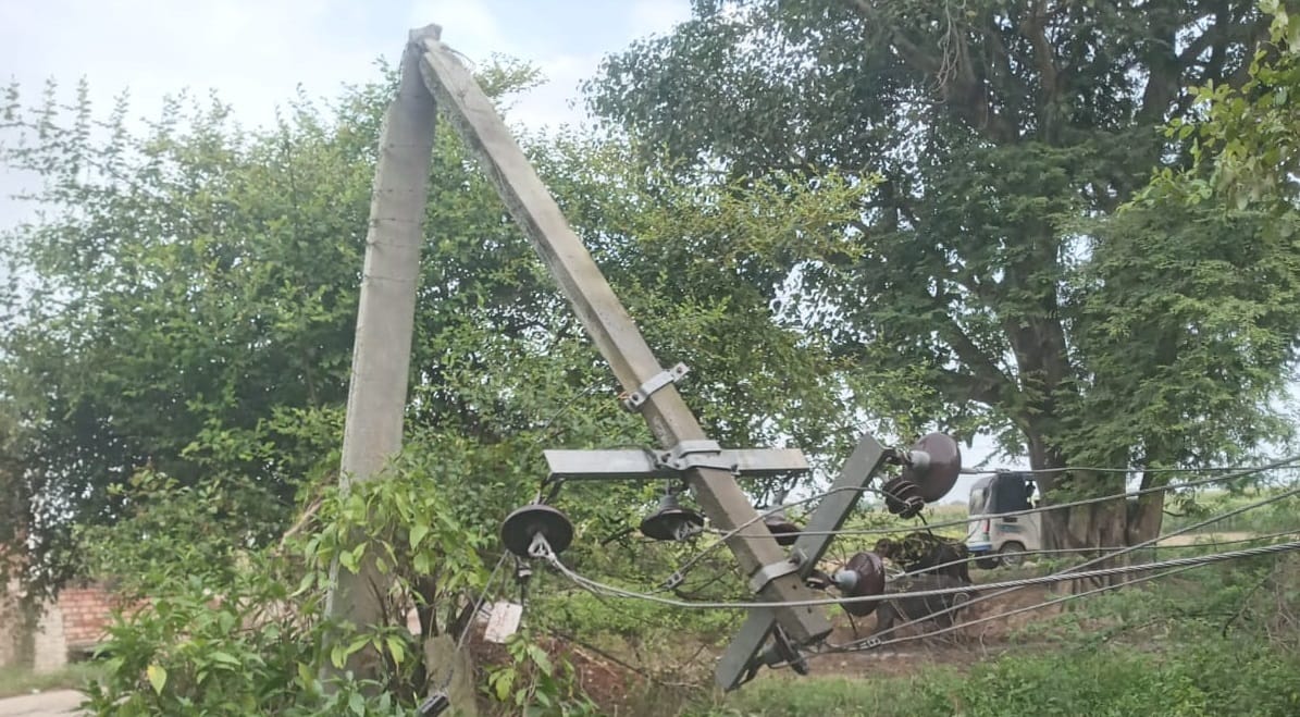 Kanpur Ht pole toppled after hit by tractor involved in illegal mining power supply disrupted in nine villages