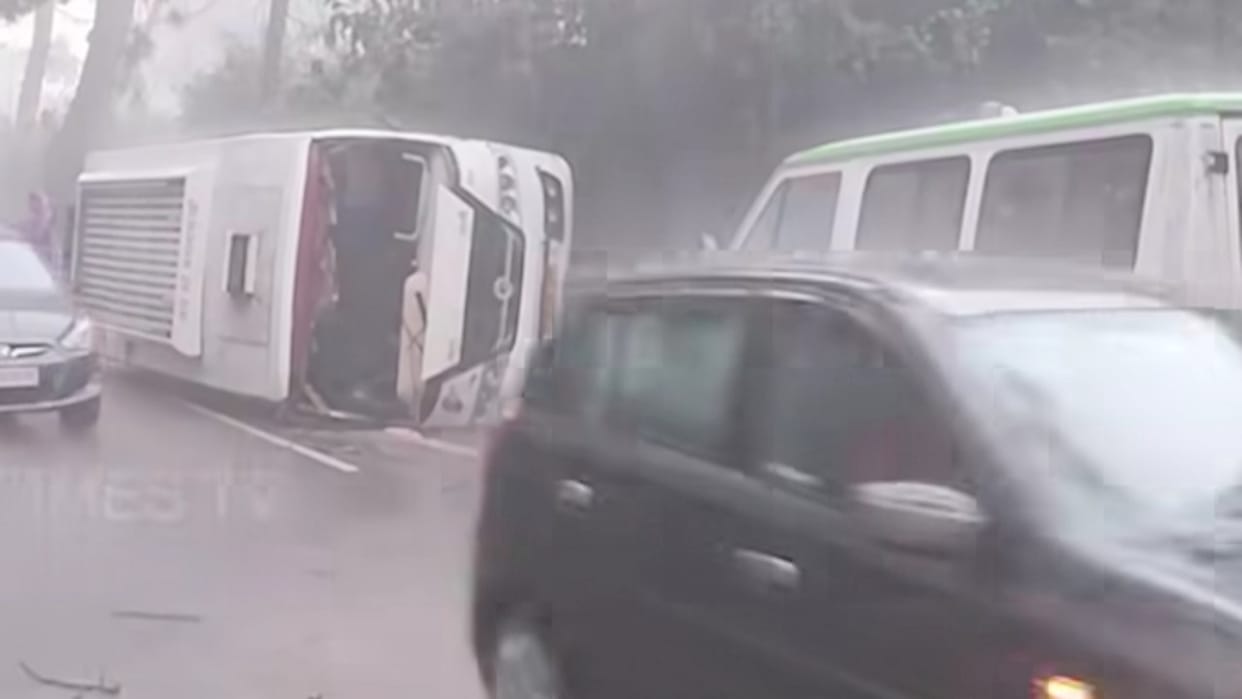 hp road accident: Private bus overturns on the road after losing control amidst heavy rain in Palampur