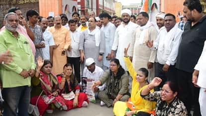 Congress-SP protest in varanasi Congress purification ritual by sprinkling Gangajal at Gyanesh school