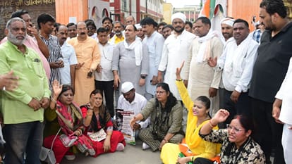 Congress-SP protest in varanasi Congress purification ritual by sprinkling Gangajal at Gyanesh school