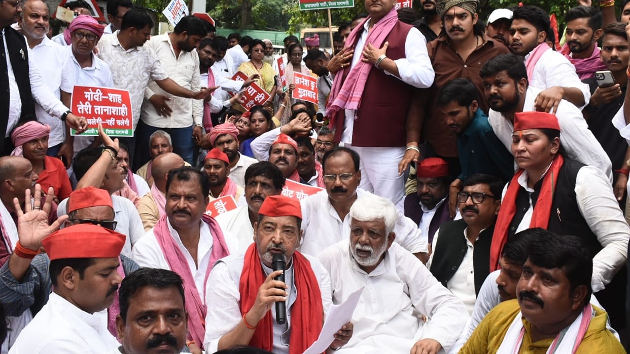 Congress-SP protest in varanasi Congress purification ritual by sprinkling Gangajal at Gyanesh school