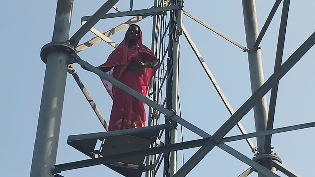 Woman climbs tower upset over daughter not being found