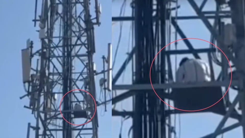 Youth from Banaras climbs tower following dispute with his wife creates stir by insisting she be brought