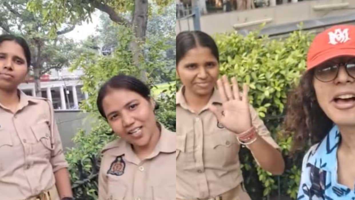 delhi protest woman cop offers food to protester video viral