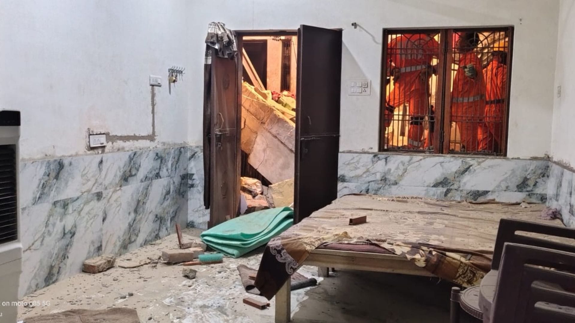 Varanasi Gunpowder blue drum Raju Khan house smell persists debris leaving local residents state of panic