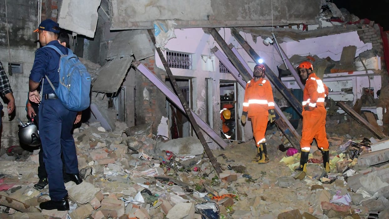 Explosion firecracker factory Dust hung debris cleared within 5 hours neighbors injuries shattered glass