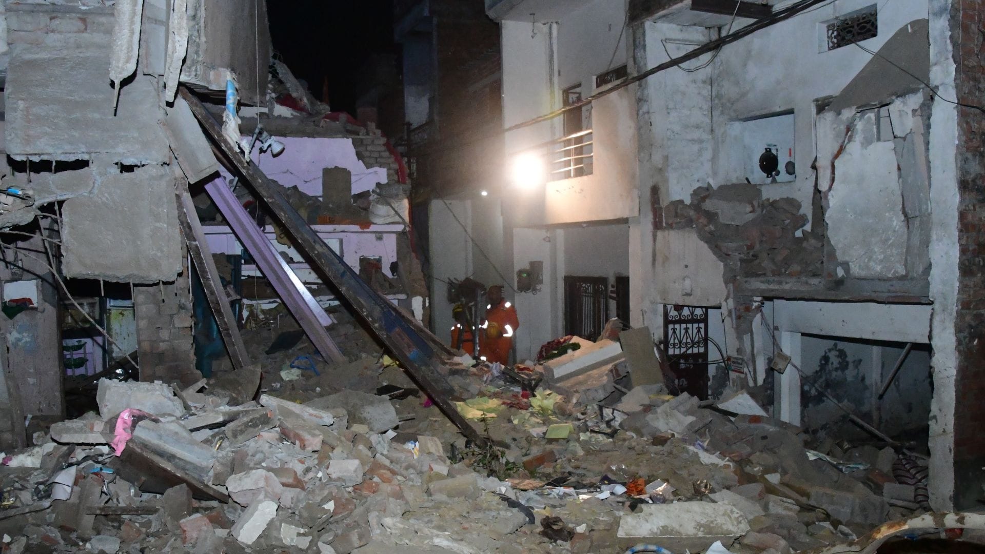 Explosion firecracker factory Dust hung debris cleared within 5 hours neighbors injuries shattered glass