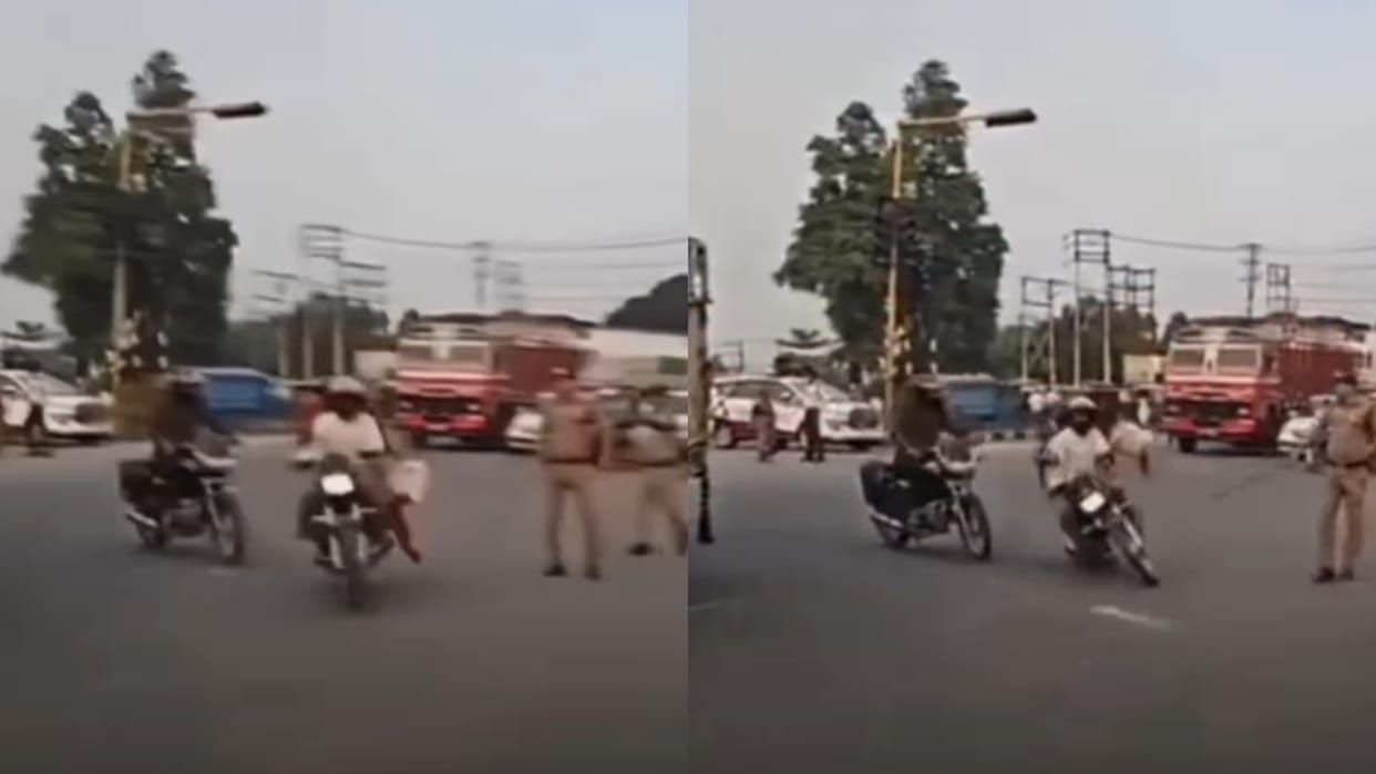 Man Takes Sudden Turn During Police Checking Wife Falls Off Bike in Rudrapur video viral