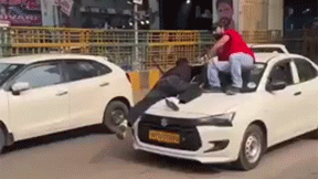noida sector 18 car driver two men hanging bonnet viral video