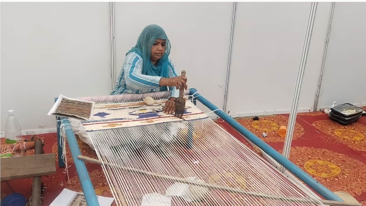 Artifacts unearthed from the depths of Rakhigarhi are being laid out on mats in haryana