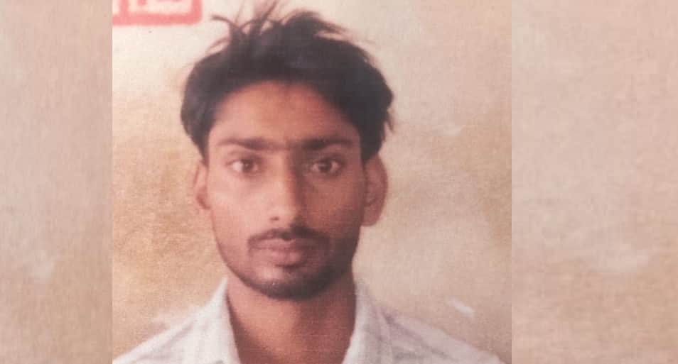 Banda Motorcycle collides with stationary dumper truck on highway;one youth dies another is injured