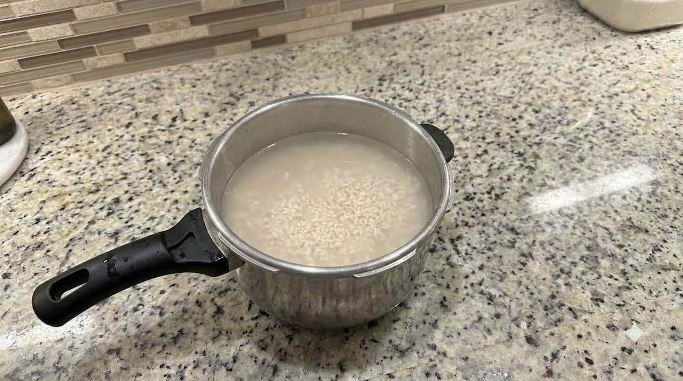 Rice become sticky when cooked in pressure cooker know easy tips to get luffy and non sticky
