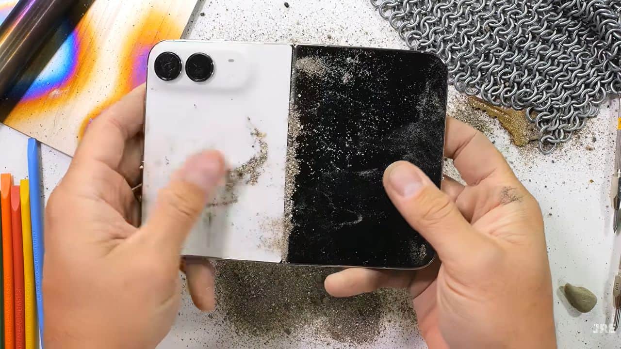 apple iphone duo durability test hinge jammed in dust nail scratch failed in bend