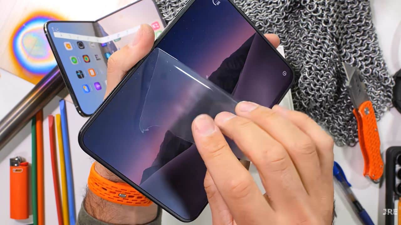 apple iphone duo durability test hinge jammed in dust nail scratch failed in bend