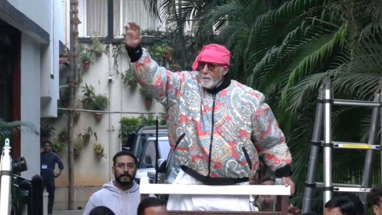 Amitabh Bachchan greeted fans outside Jalsa amid heavy security on Sunday Son Abhishek Bachchan joins