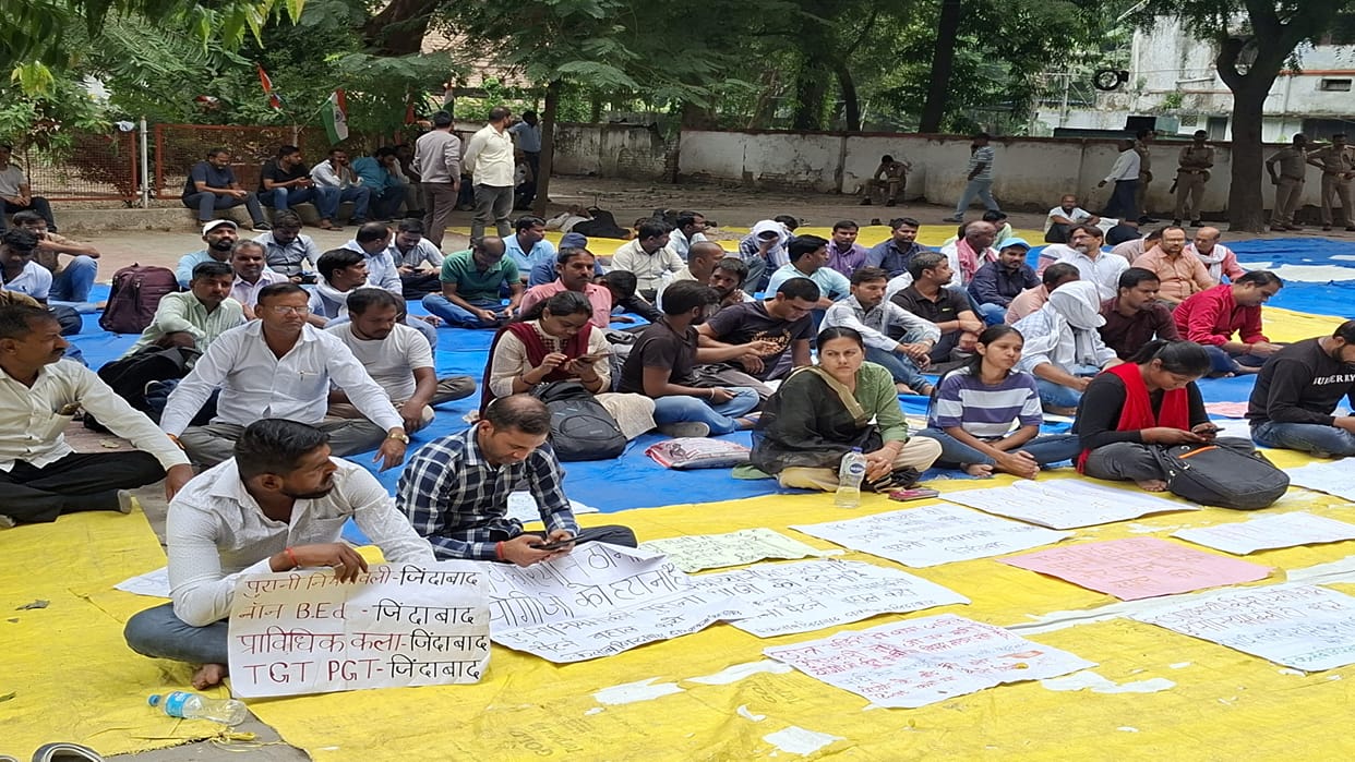 Aspirants camp at the Directorate of Education; department doors remain locked