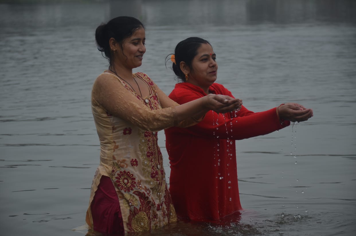 Devotees take a dip in the Ganges