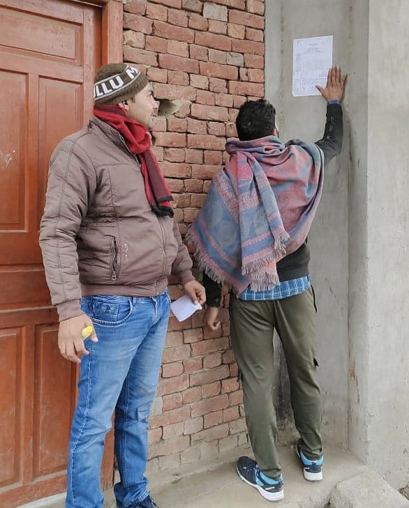 Posted fine notices on illegal occupants