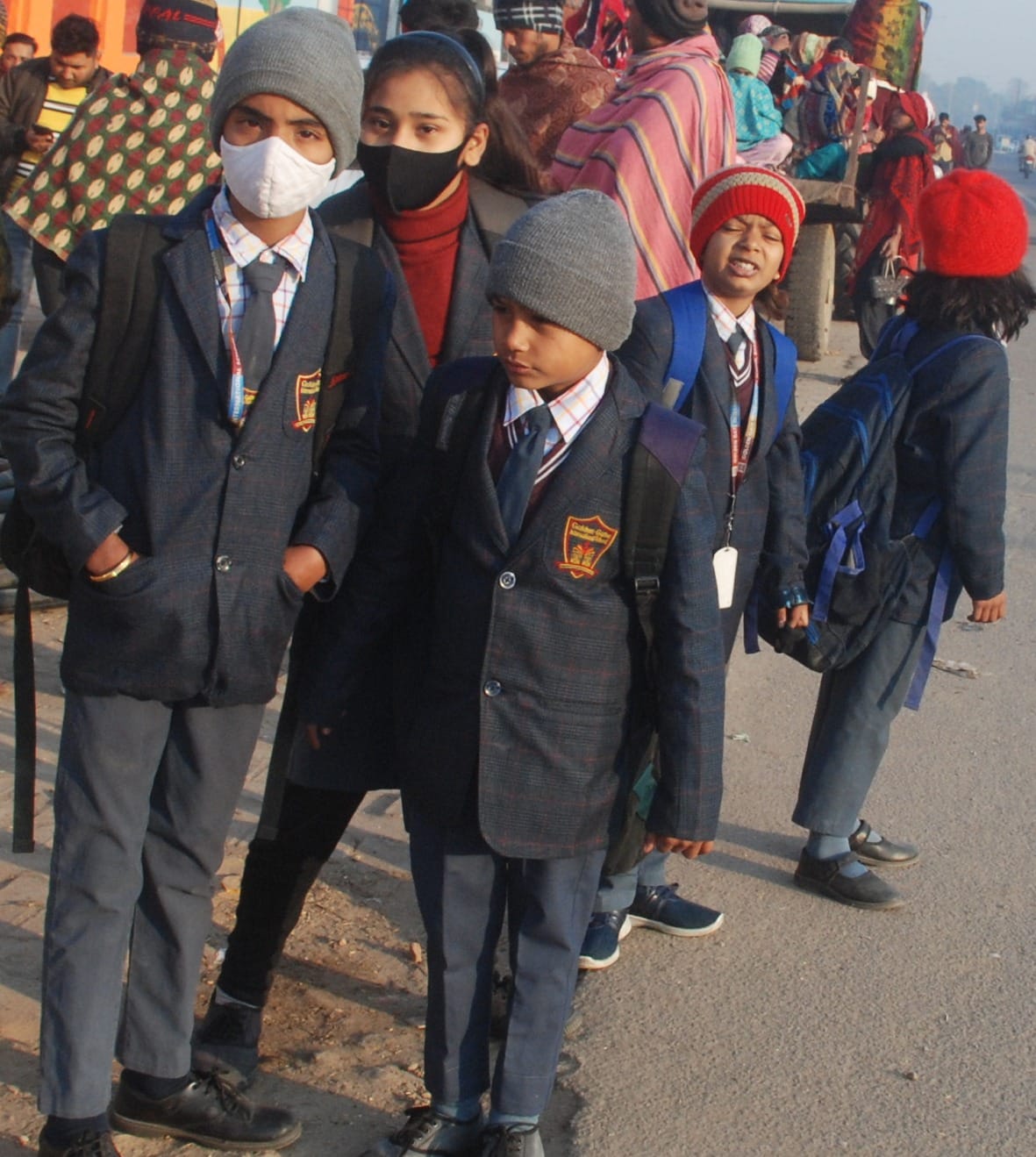 People shivered from frost and cold wind, temperature reached three degrees