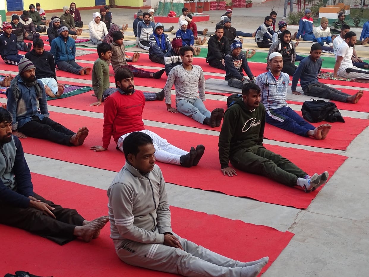 Gayatri mantra resounding in jail, prisoner engrossed in yoga