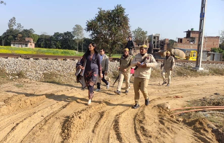 Potholes filled with soil and stones on State Highway