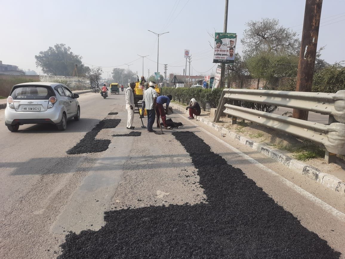 Patchwork on Murthal Road before the arrival of the Home Minister