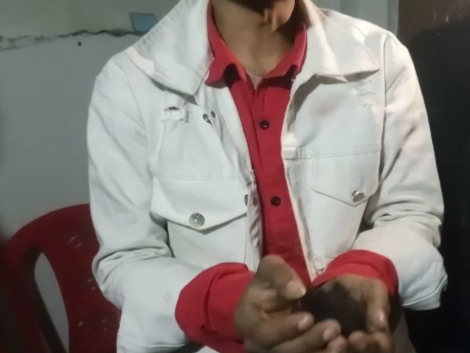 Young man sitting with female friend in cafe cut hair, made cock
