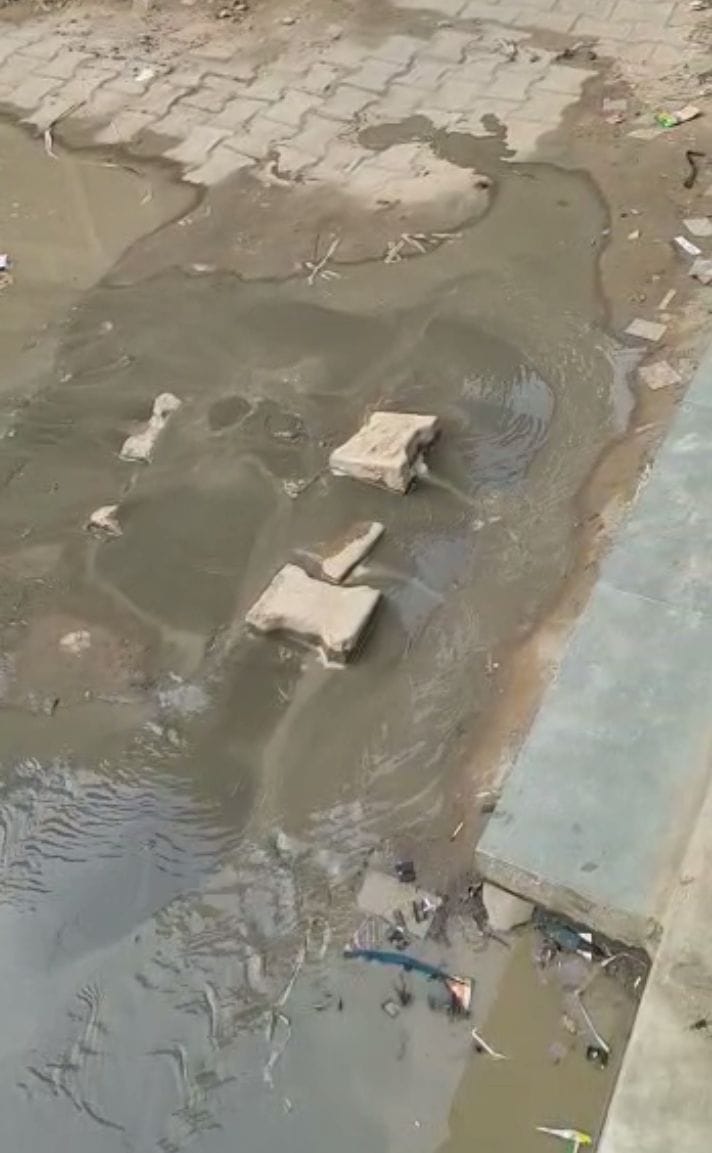 Water flowing in vain in the street of Kont Road due to leakage of pipeline
