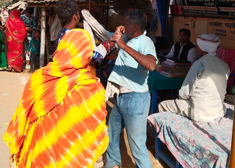 beaten up for stopping him from signing the deed