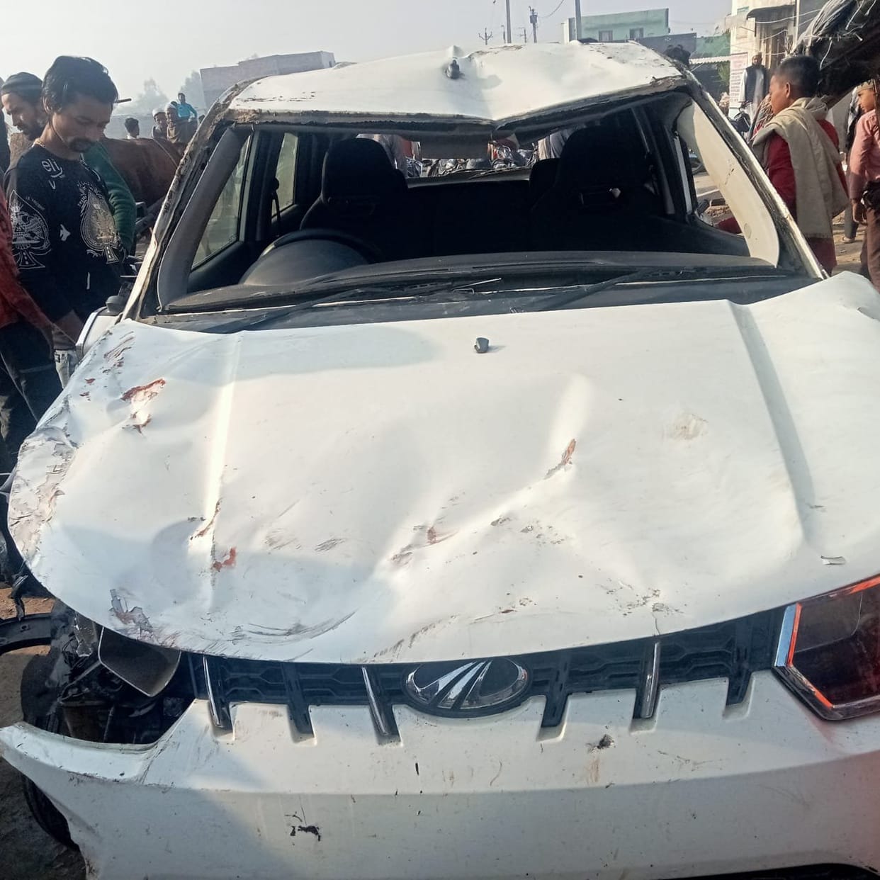 Speeding car broke four pillars, collided with mother and son