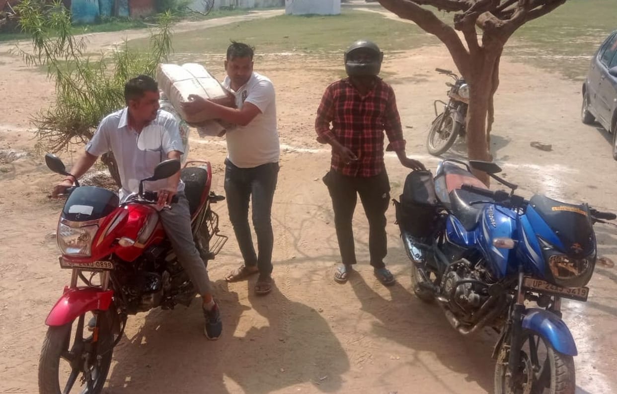 Negligence: Answer books being delivered to the warehouse by scooty and bike