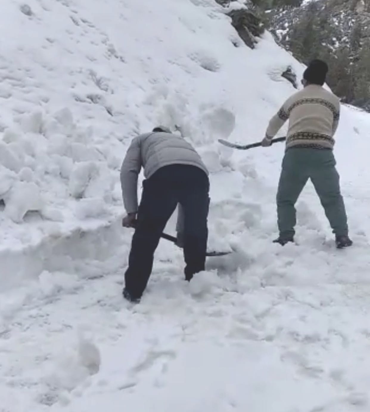 Female patient carried to the hospital on her back in the snow