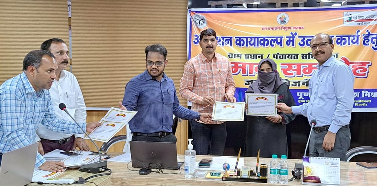 Principal, secretaries honored for excellent work